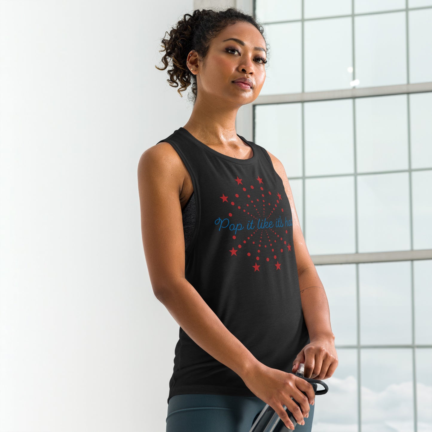 Black Fourth of July tank for women — cheeky “Pop It Like It’s Hot” firework design on relaxed muscle tee