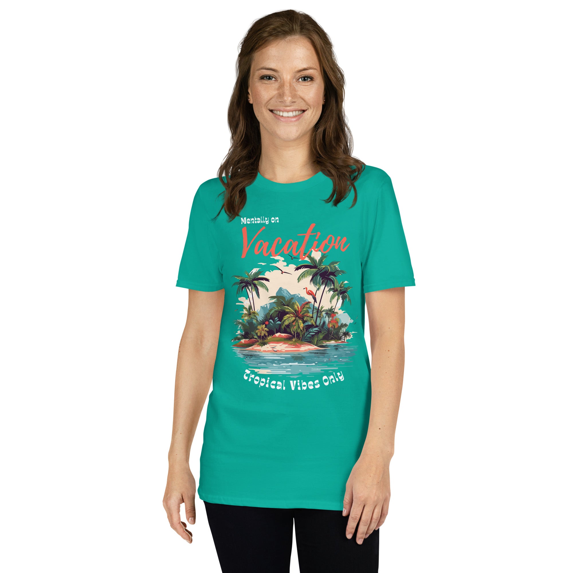 Woman in jade green grapgic tee that reads "Mentally on Vacation" and "Tropical Vibes Only" with an island graphic