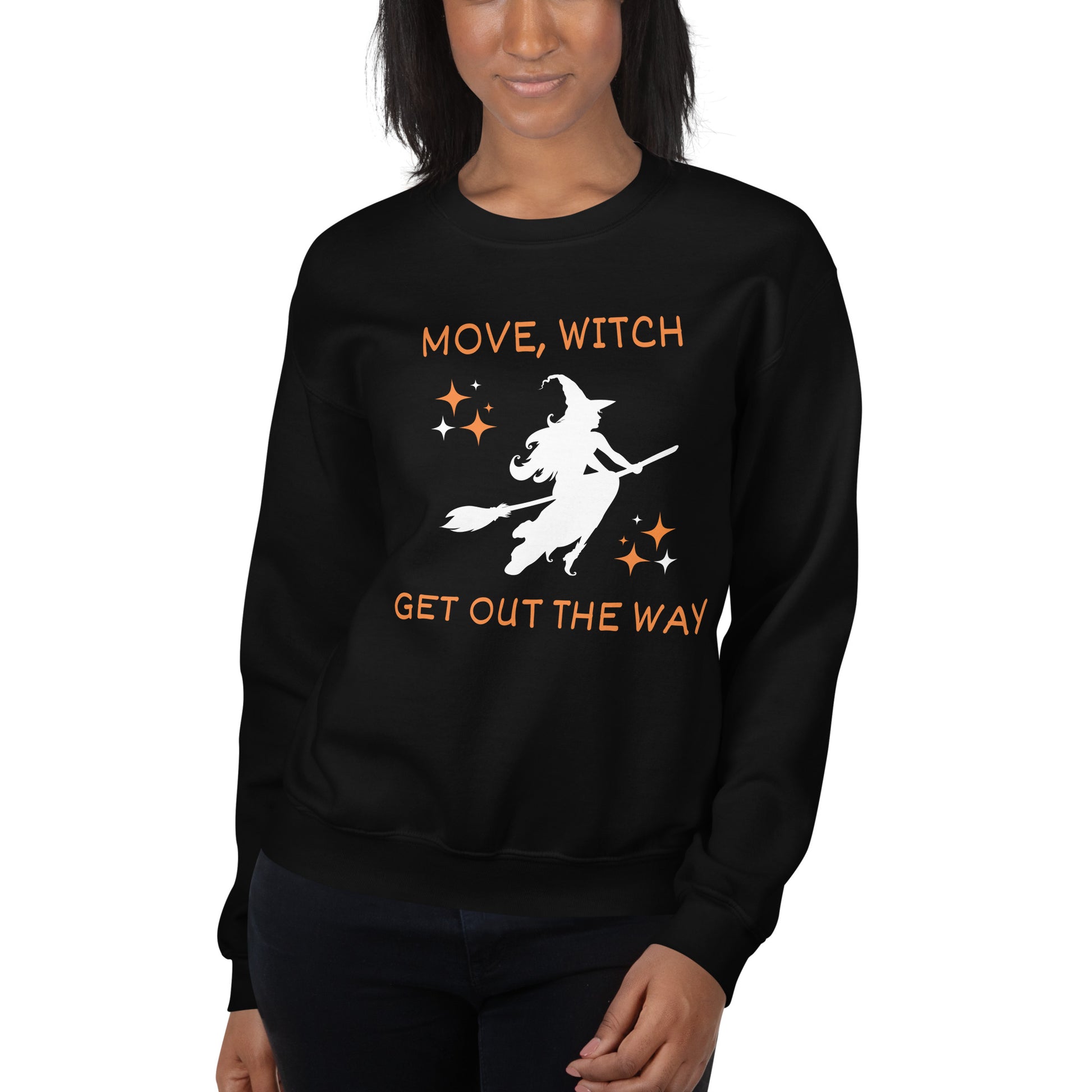 Woman wears black Halloween sweatshirt with the white silhouette of a witch on a broomstick. The shirt says "Move, Witch Get out the way".