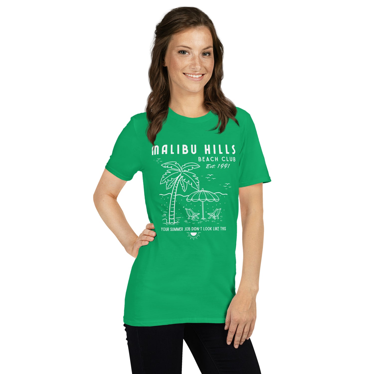 Model wearing Malibu Hills Beach Club nostalgic 90s summer tee in kelly green with white graphic text, relaxed fit