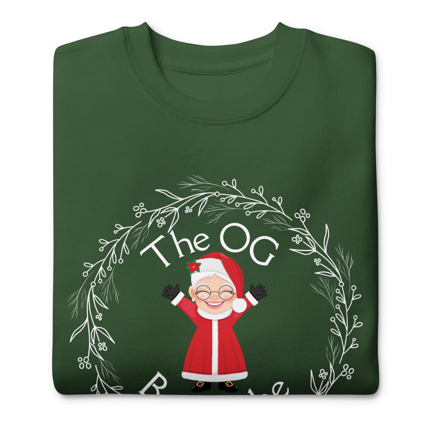 Folded Christmas sweatshirt with an image of Mrs. Claus that reads "The OG Boss Babe"