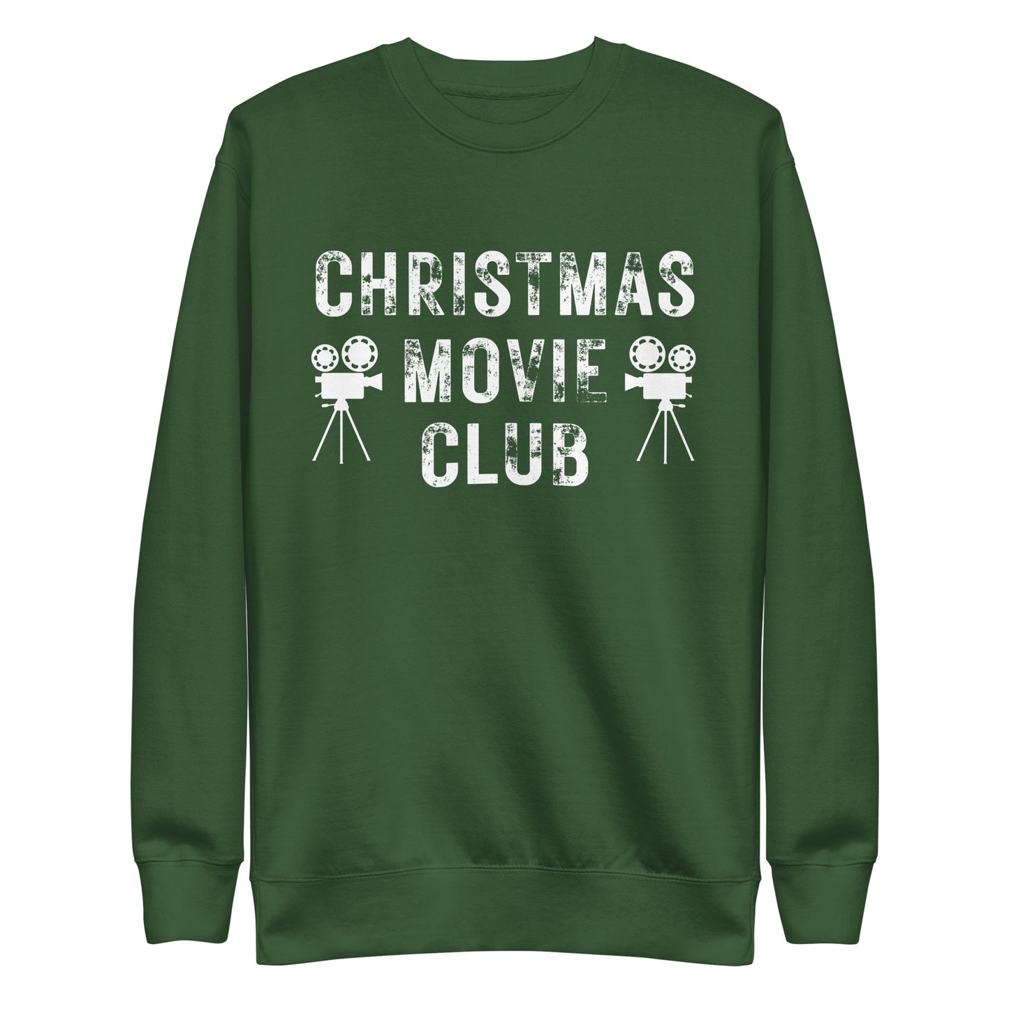 Forest green crewneck sweatshirt with distressed white text reading 'CHRISTMAS MOVIE CLUB', decorated with retro movie camera icons. Perfect for holiday movie marathons.