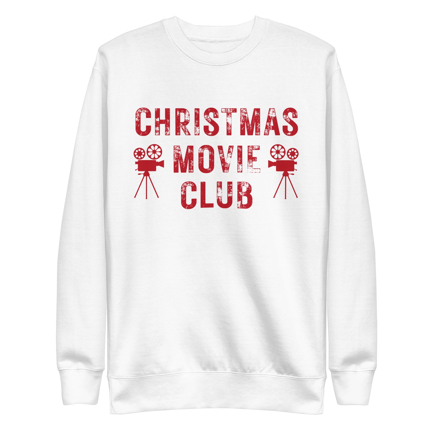 White crewneck sweatshirt with distressed red text reading 'CHRISTMAS MOVIE CLUB', decorated with retro movie camera icons. Perfect for holiday movie marathons.