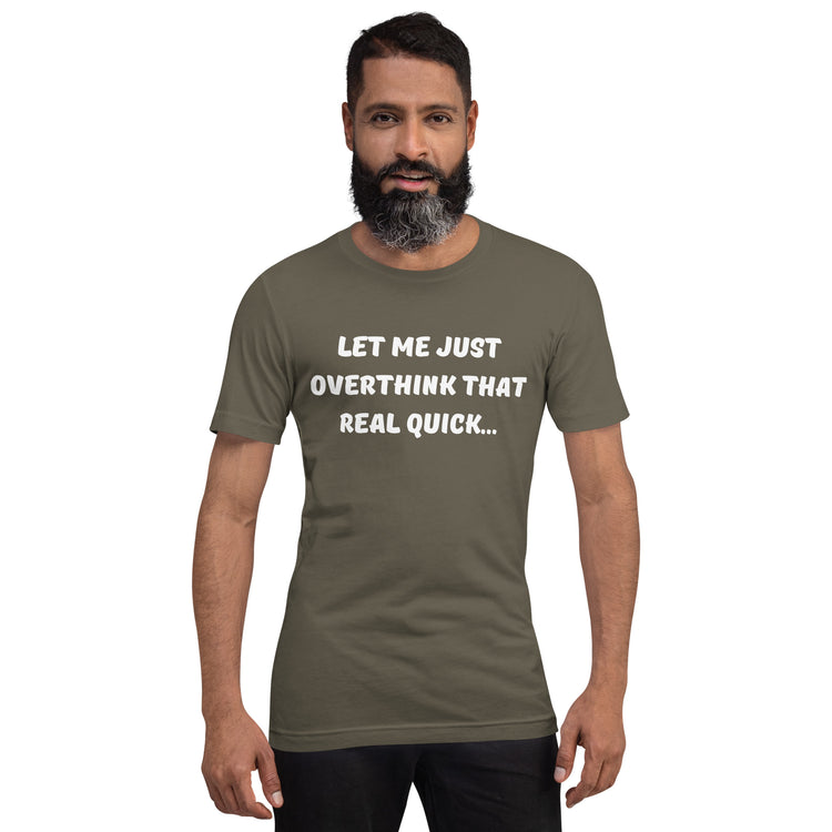 Bearded man wears an army green shirt that reads "Let me just overthink that real quick..."
