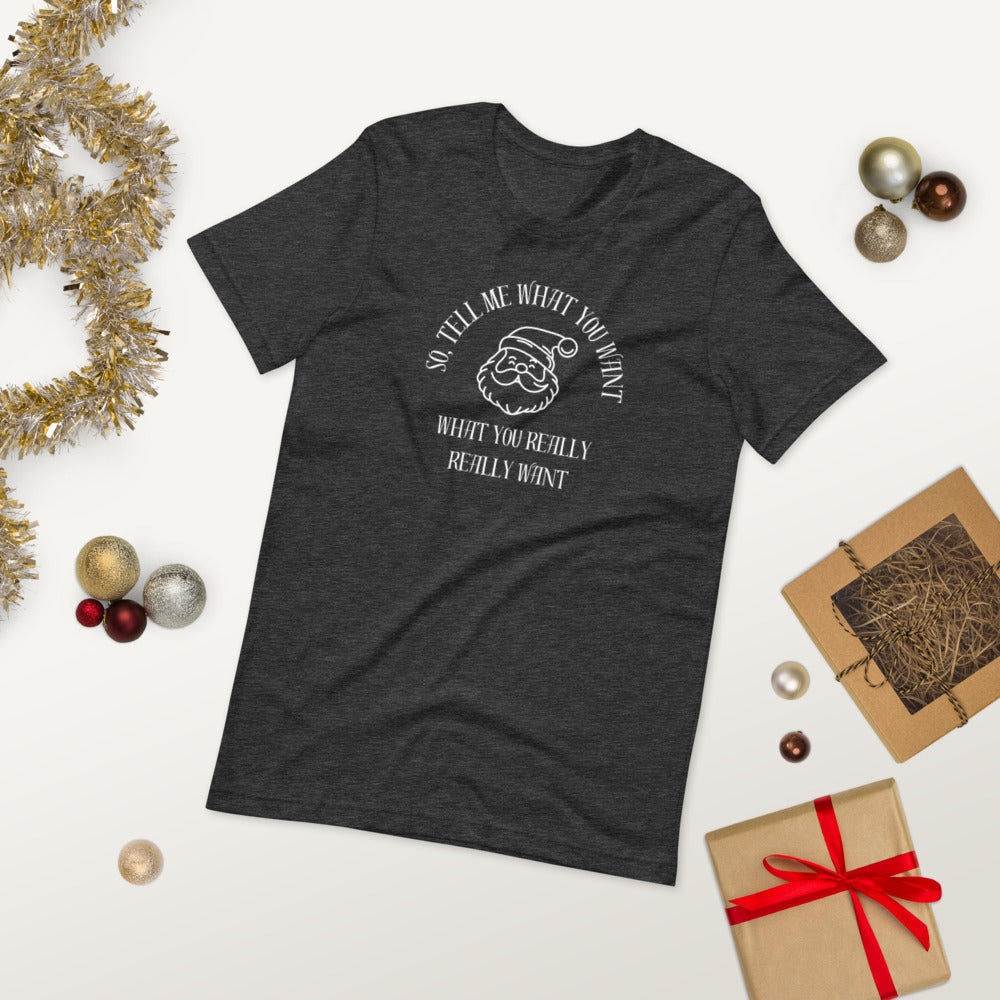 Festive gray unisex tee shirt featuring Santa's face and the text "So Tell Me What You Want What You Really Really Want"