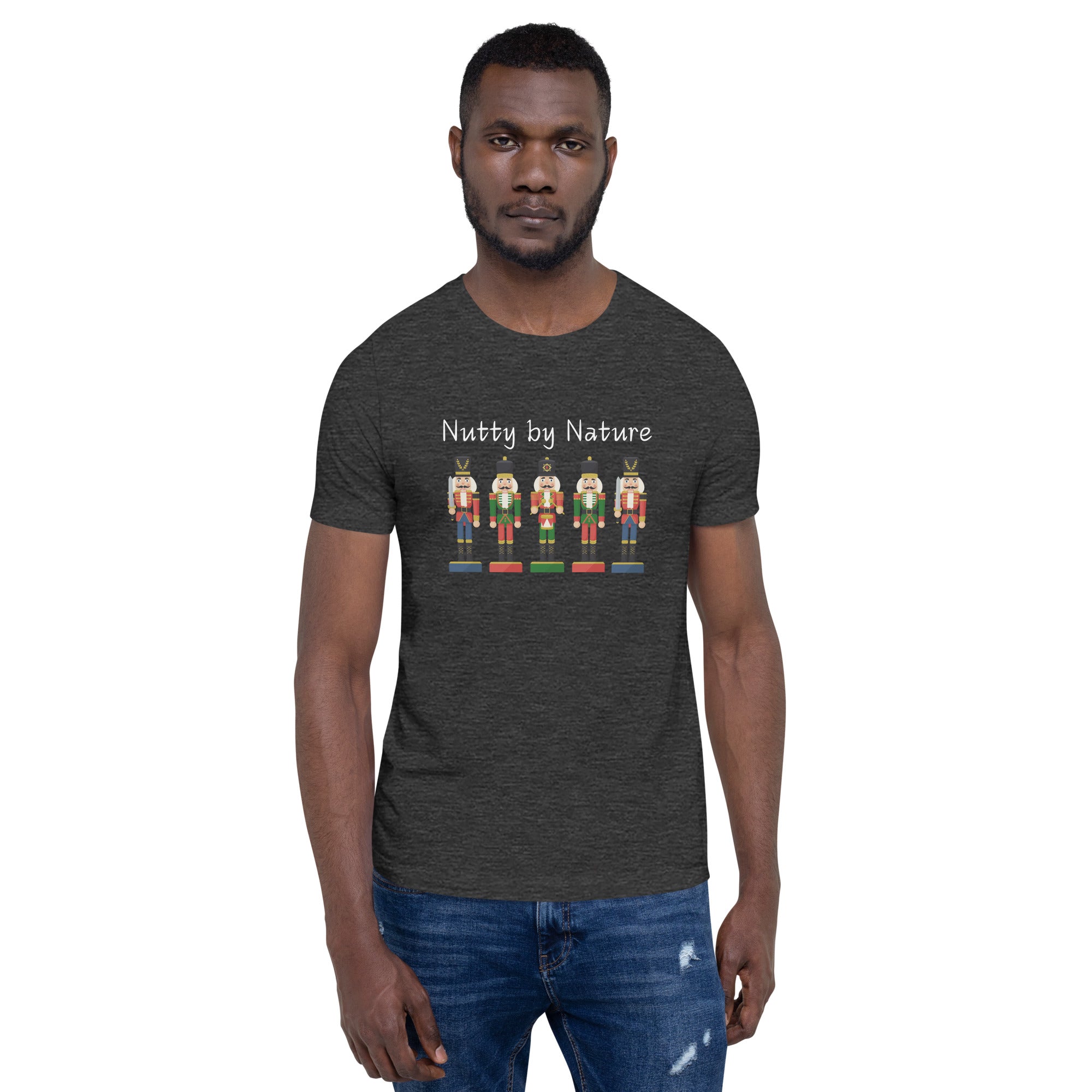 Man wears festive and playful holiday shirt featuring five nutcrackers and text that reads "Nutty by Nature"