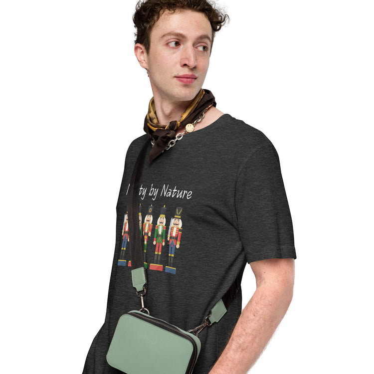 Man wears festive and playful holiday shirt featuring five nutcrackers and text that reads "Nutty by Nature"