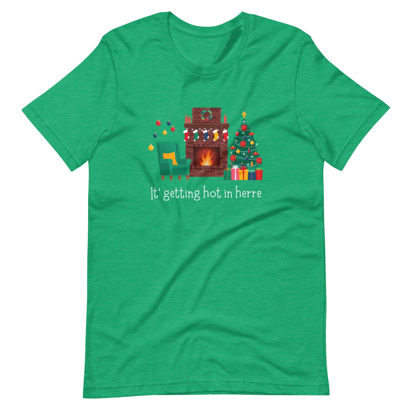 Festive green holiday tee shirt reads "It's getting hot in herre". The design shows a cozy Christmas living room with holiday decorations and a roaring fireplace.