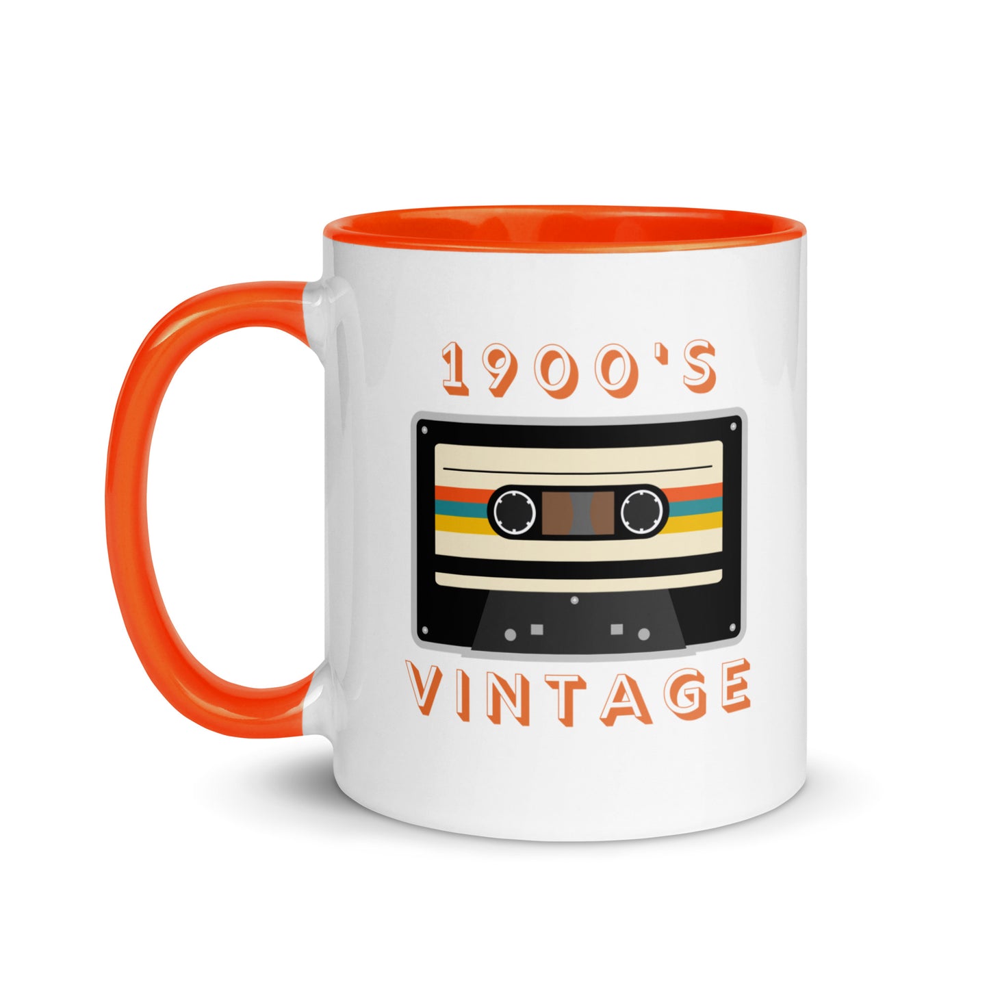 White ceramic mug with orange interior and an orange handle sits against a white background. It displays a retro looking cassette tape and the words "1900s VINTAGE". A Jade Street Market original mug.