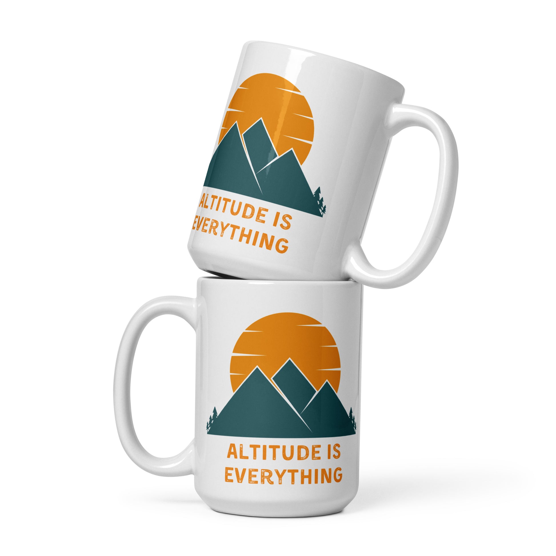 Two white cermaic mugs are stacked on top of each other showing the same design on the front and back - the text reads "Altitude is Everything" and the graphic displays a mountain scene with a large sun.