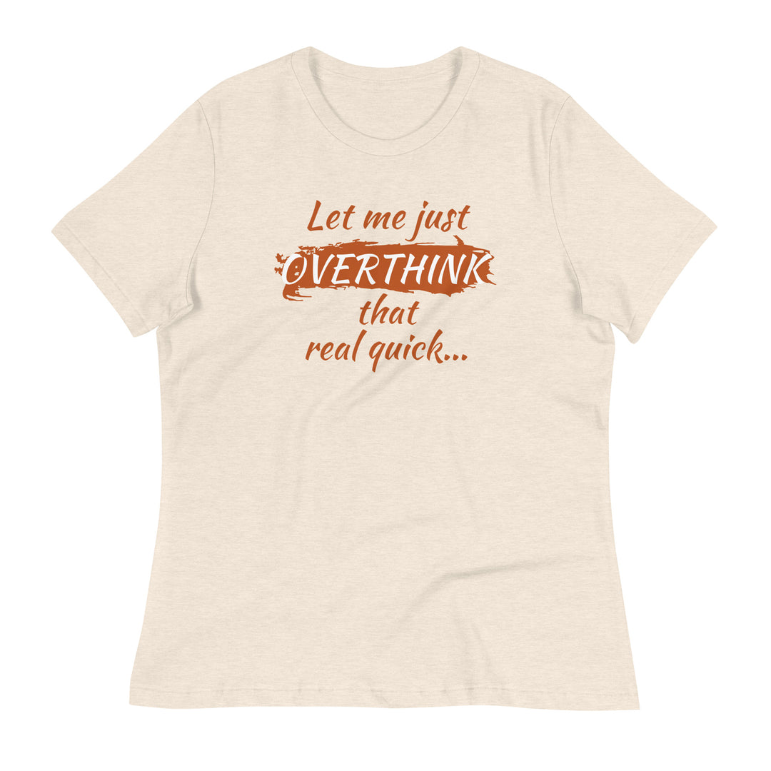Flat lay of a cream-colored tee with retro burnt orange lettering — "Let me just overthink that real quick" shirt for overthinkers.