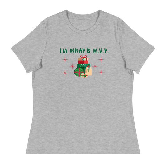 Women's festive holiday tee reads "I'm wrap's MVP" next to a stack of neatly wrapped holiday gifts and red stars.