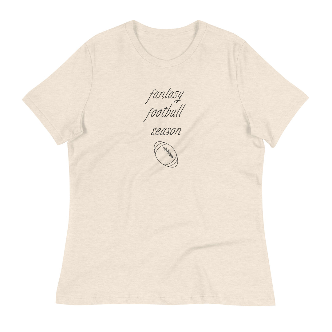Heathered off-white women's tee shirt that reads "FANTASY FOOTBALL SEASON" along with an image of a football. The font is a thin and flowy cursive that is pretty and feminine.